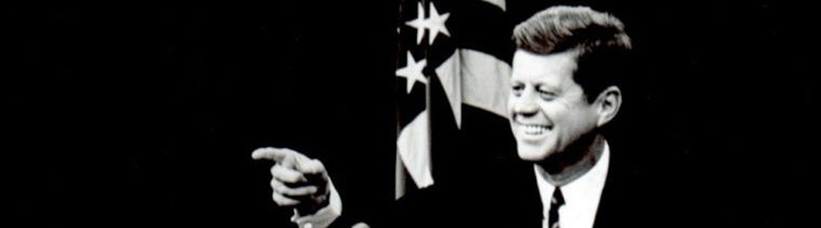 jfk at press conference smiling